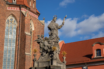 Monument to John of Nepomuk in Wroclaw, representing a saint surrounded by angels and holding a...