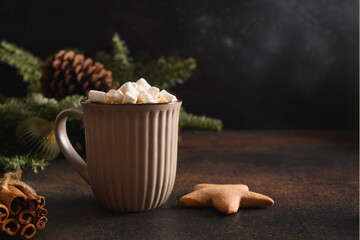 Christmas coffee with marshmallow and cookies as star on dark background. Xmas holiday. Close up.