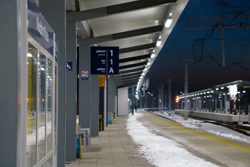 Beautiful and modern platform at the train station in winter.