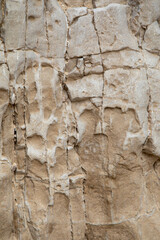 Fototapeta na wymiar Abstract nature texture. Rock surface or Beige mountain. Natural material background. Rock climbing backdrop, copy space. High quality photo