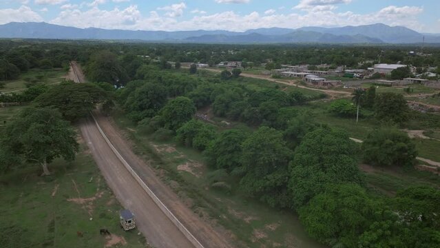 aerial shot of new fence wall on the dominican border with Haiti. 4K video.