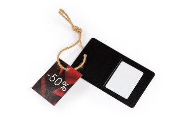 Carton clothing swing tag and discount tag on yellow rope