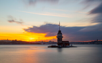 Istanbul, Turkey. Sunset over Bosphorus with famous Maiden's Tower (Kiz Kulesi) symbol of Istanbul,...