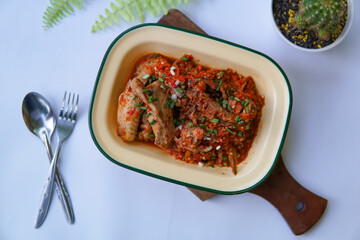 Seblak is a Southeast Asian savoury and spicy dish, originating from Indonesia, made of wet krupuk (traditional Indonesian crackers) cooked with protein and sometimes chicken feet added. Isolated