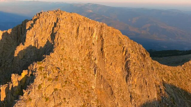 hover on Canigou summit, survol avec drone de la montagne sacr&eacute;e des catalans au lever du jour