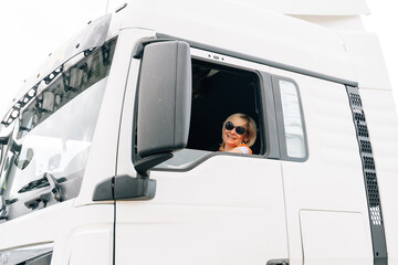 Middle age truck driver woman, trucker occupation in Europe for females