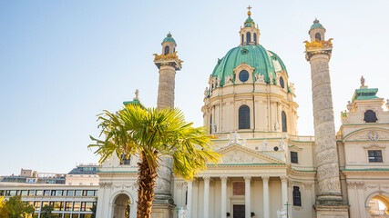 Front view of Saint Karl Cathedral in Vienna at Autumn colors, Austria, at direct front sunlight of...