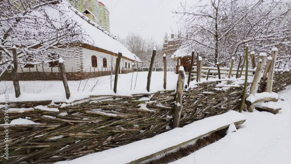 Wall mural Vintage estate in winter Mamajeva Sloboda Cossack Village, Kyiv, Ukraine