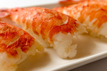 Black tiger prawn sushi on white background