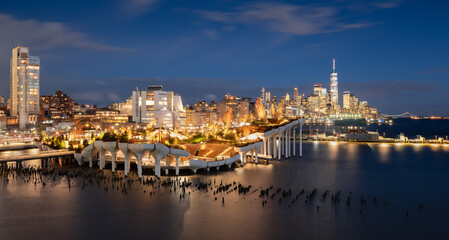 New York City, Little Island at dusk. Elevated public park with amphitheater at Hudson River Park...