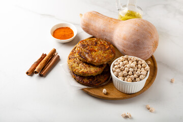 Close up of stack pumpkin vegetables fritters pancakes cinnamon chick peas healthy food