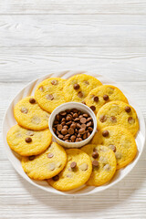 chocolate chip lemon yellow cookies on a plate