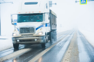 Naklejka premium Truck on the winter highway