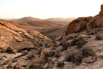 Scenic View of Desert and Volcanic Landscape whit Houses at sunset in Fuerteventura,Canary Island