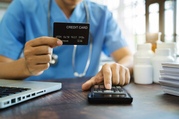 Doctors use a service fee calculator to save money on health insurance, drug cost concepts.