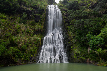 Fototapeta na wymiar Multi-tiered falls of Karekare falls, Auckland, New Zealand.