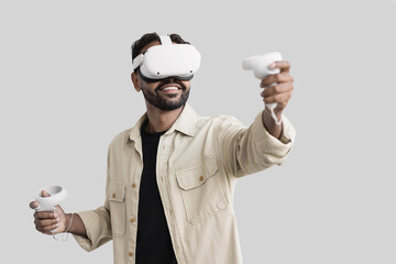 Young man using virtual reality headset at home, VR, future gadgets, technology, virtual event,...