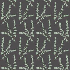 Boho seamless pattern with eucalyptus branches on gray background.