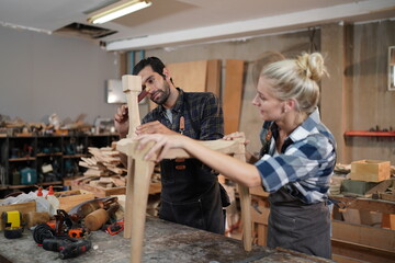 Contemporary Carpenter Working, Portrait of modern carpenter making wood furniture while working in...