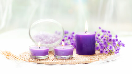 Plakat Spa beauty massage health wellness background.  Spa Thai therapy treatment aromatherapy for body woman with purple flower nature candle for relax and summer time. Copy space and banner