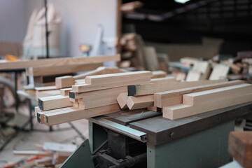 Contemporary Carpenter Working, Portrait of modern carpenter making wood furniture while working in joinery lit by sunlight with factory background on small business concept, copy space