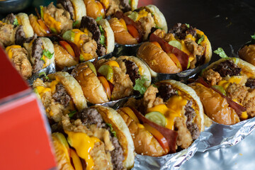 gourmet burger being prepare on hamburger bar kitchen