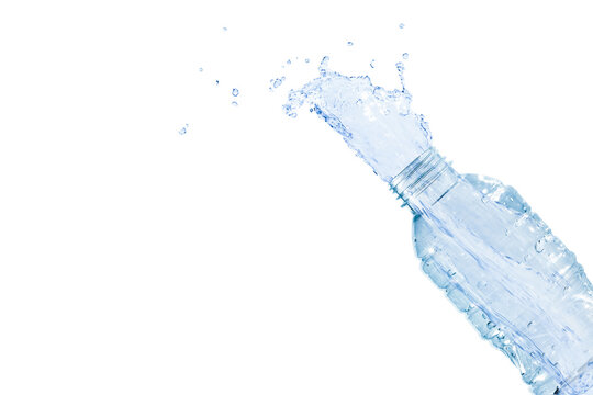 Image isolated motion the water splash on the water bottle drink falling shape and drop on the white background with copy space for text.
