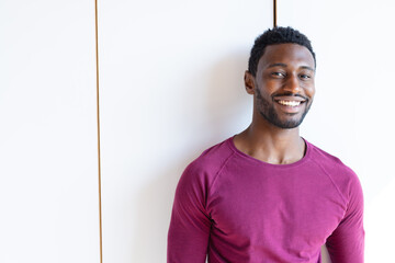 Portrait of happy african american man looking at camera and smiling