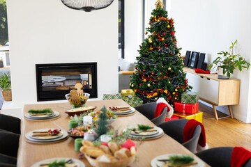 Close up of table with dinner and decorations at christmas