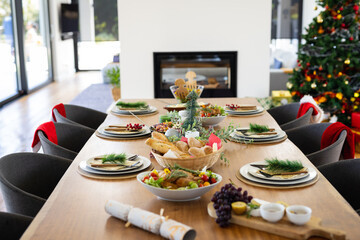 Close up of table with dinner and decorations at christmas