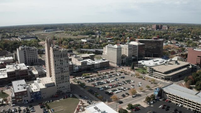 Flint, Michigan skyline wide shot with drone video moving sideways.