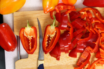 Slices red peppers, which is added to the food to give the taste of the dish