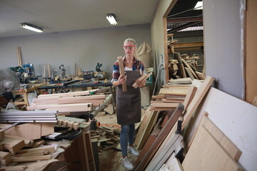 Fototapeta na wymiar Carpenters Assembling Furniture, Small business in wood DIY workplace office background