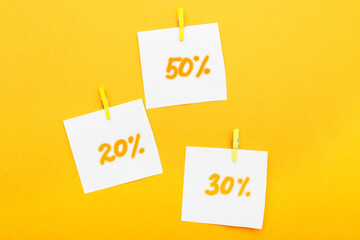 discount paper stickers on an orange background