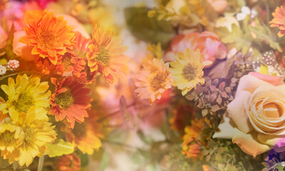 Colorful blur background with artificial flowers.