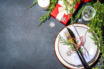 Christmas, New Year, Thanksgiving winter holiday table setting for holiday dinner. Festive...