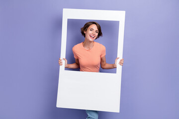 Portrait of satisfied positive lady stylish outfit beaming smile photo studio two arm hold white...