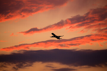 silhouette airplane in the sunset