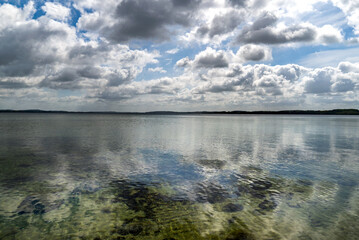 Fototapeta premium clouds reflected in water