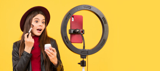 amazed teen girl blogger use selfie led lamp and smartphone, selfie. Cosmetics for teenager child,...