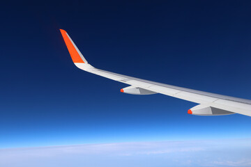Fototapeta na wymiar airplane wing in flight
