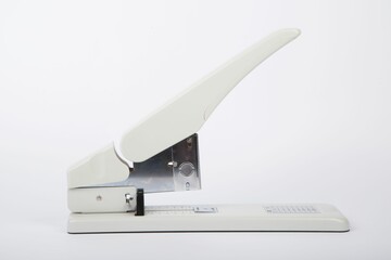 Manual stapler isolated on white background
