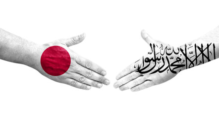 Handshake between Afghanistan and Japan flags painted on hands, isolated transparent image.