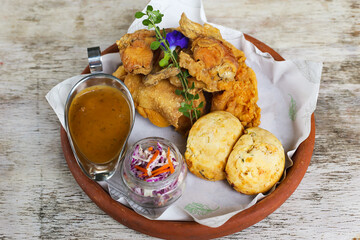 Beer Battered Fish and Chips served in a dish isolated on background top view of fastfood