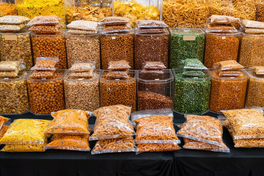Variety types of Indian snacks selling at the booth.