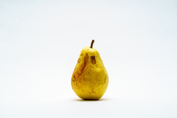 yellow juicy pear on white background, object in the center 