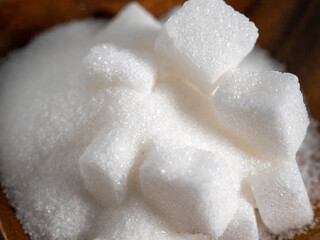 Fototapeta na wymiar Sugar on a white background. Junk food concept.