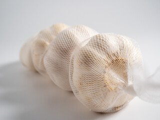 Garlic on a light background. Healthy food concept.