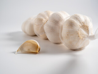 Garlic on a light background. Healthy food concept.