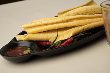 fafda Gathiya (fafda jalebi) is a very popular Gujarati snack, common street snack from India.